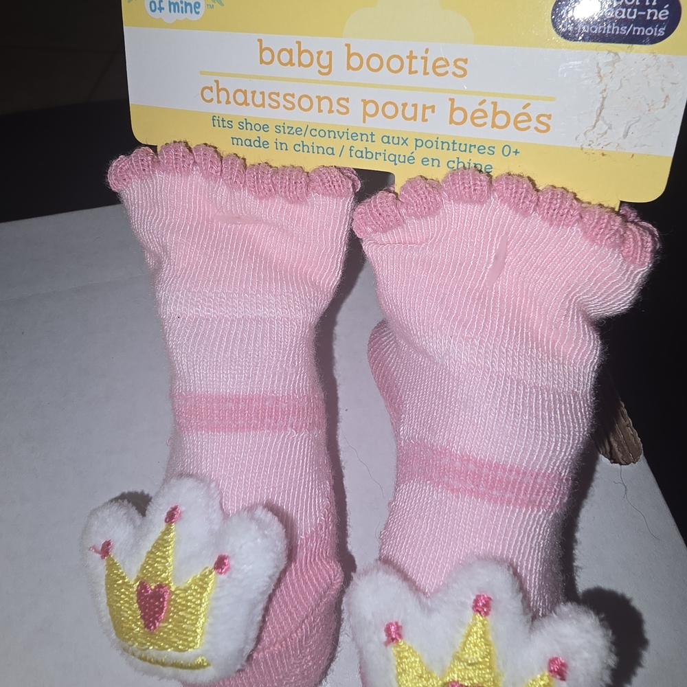 Baby Booties with Crown Design, Dolly, and an Activated Prayer Bear are Included